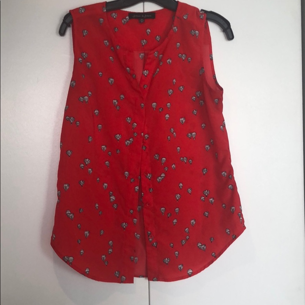 Red sleeveless blouse